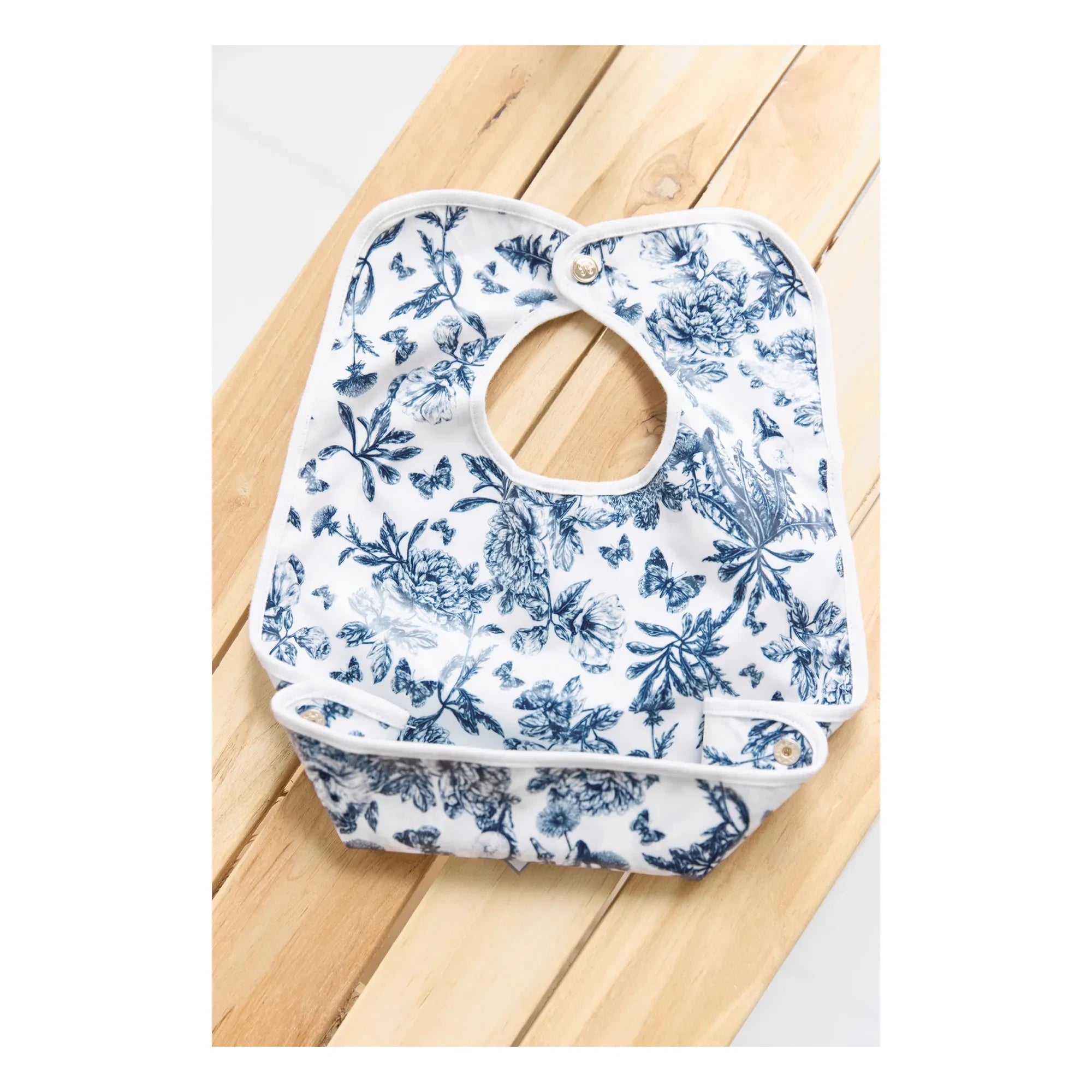Tartine et Chocolat - Toile de Jouy coated bib | Navy blue