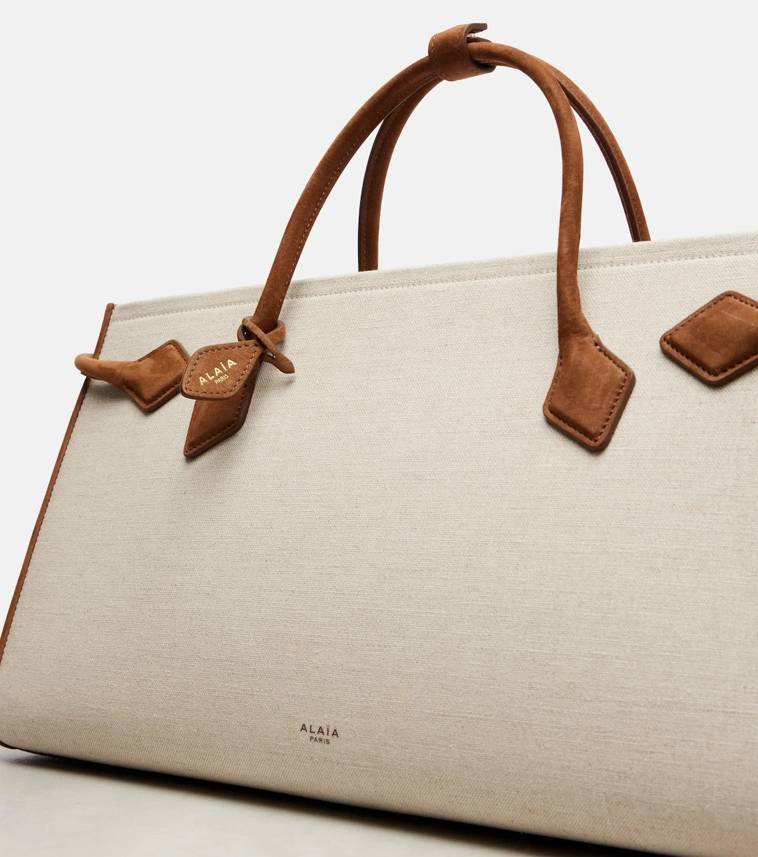 Alaïa - Le Teckel leather-trimmed canvas tote bag