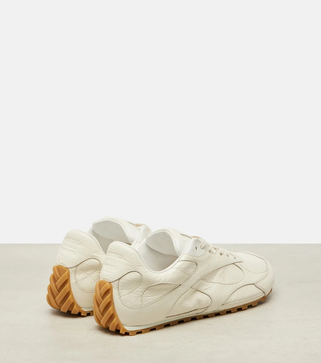 Bottega Veneta - حذاء رياضي Orbit Flash الجلدي