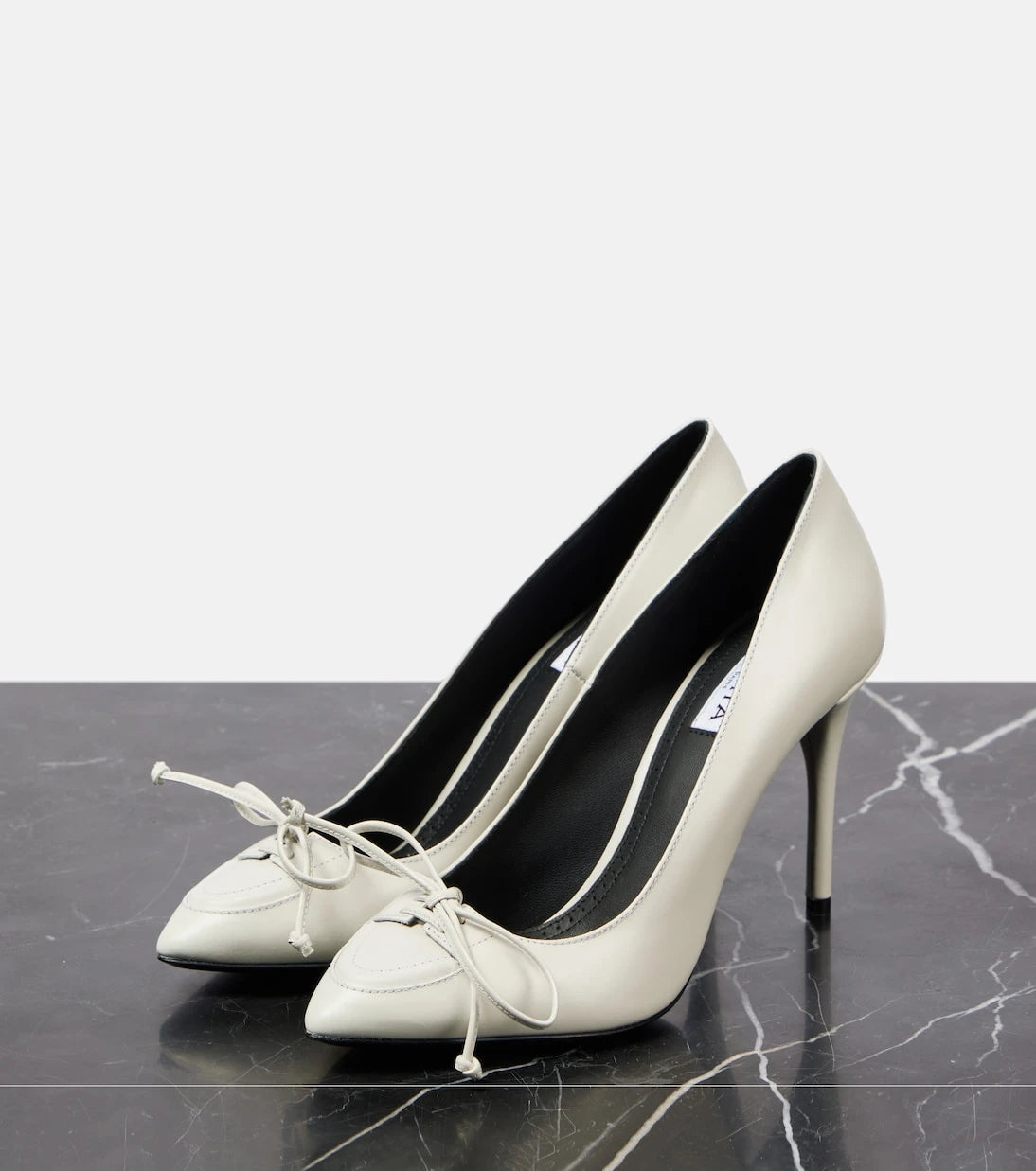 Alaïa - 90 bow-detail leather pumps