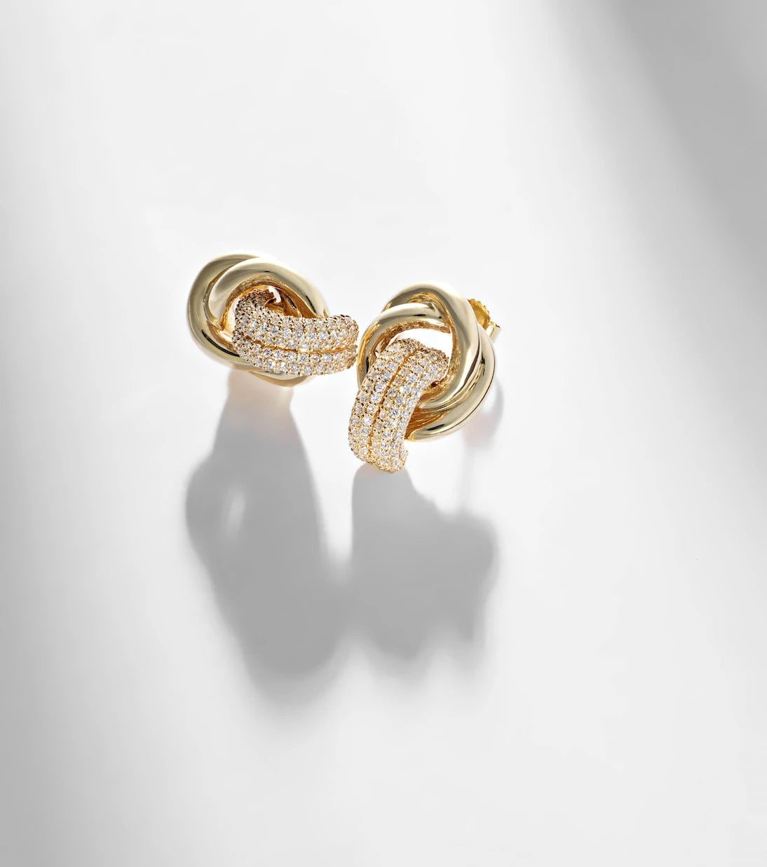 Stone and Strand - 14kt gold earrings with diamonds
