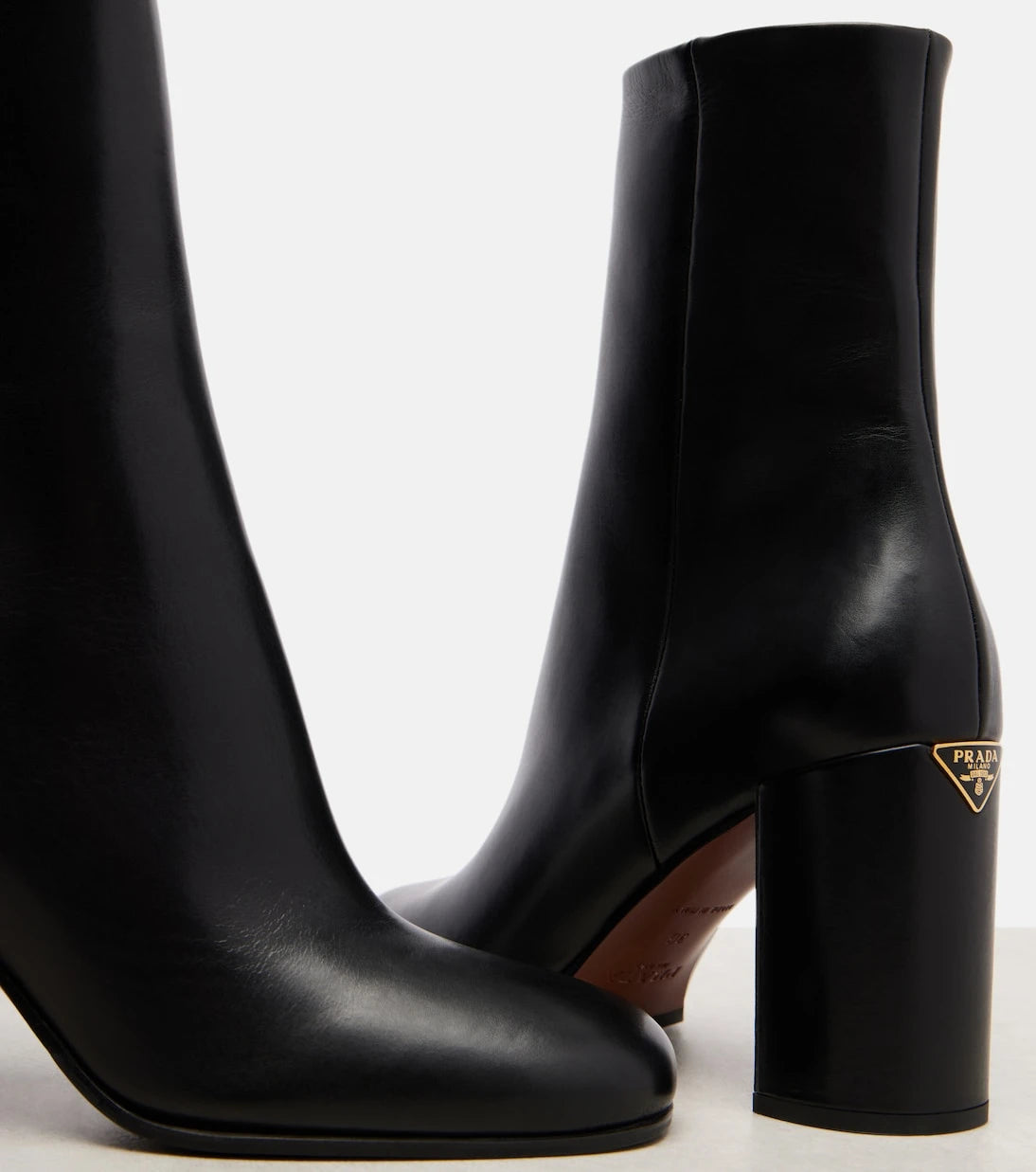 Prada - Logo leather ankle boots