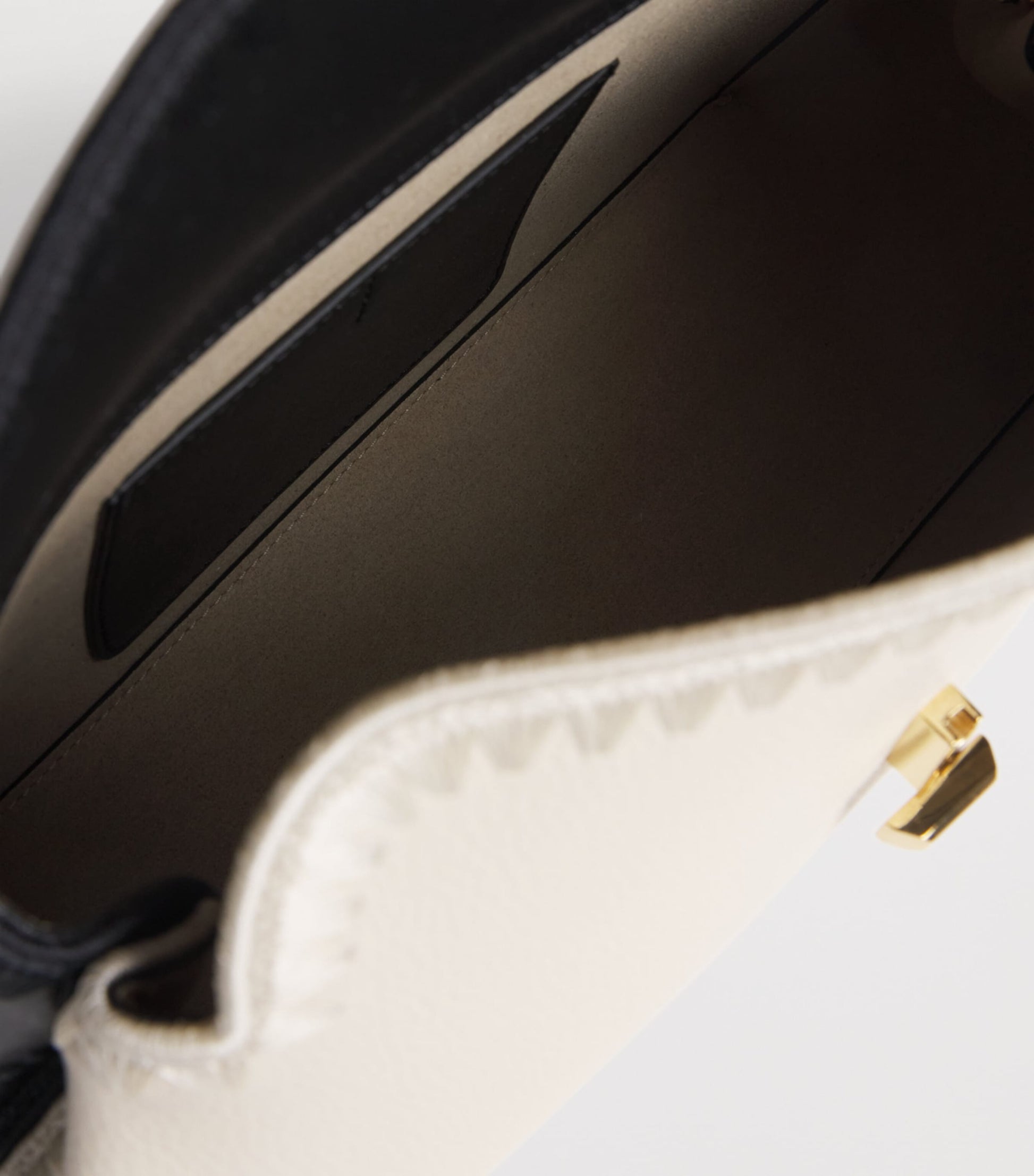 Leather T-Lock Clutch Bag