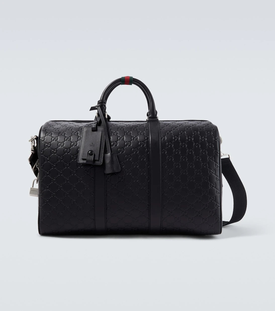 Gucci - حقيبة دافل متوسطة من الجلد بشعار GG