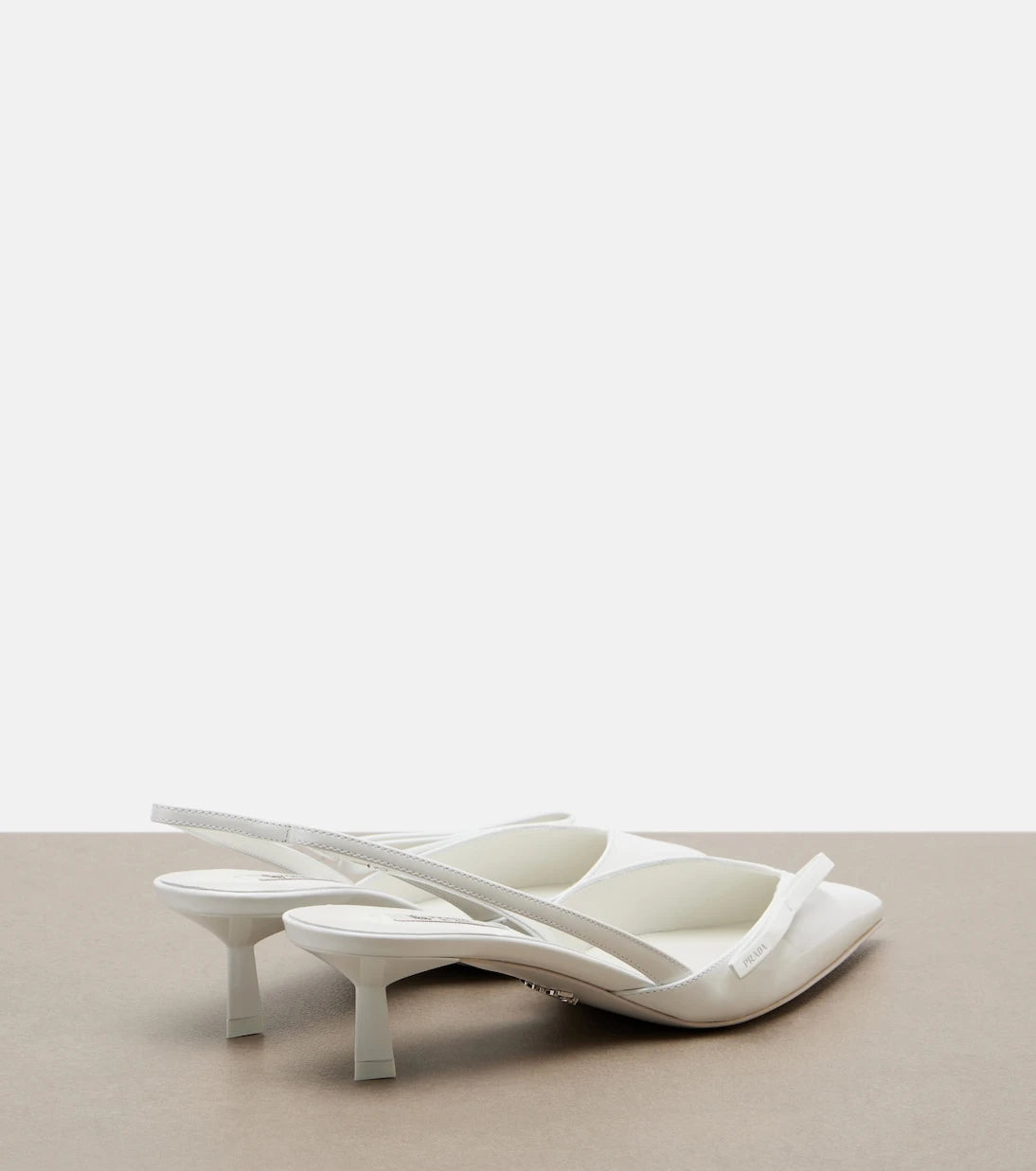 Prada - Patent leather slingback pumps