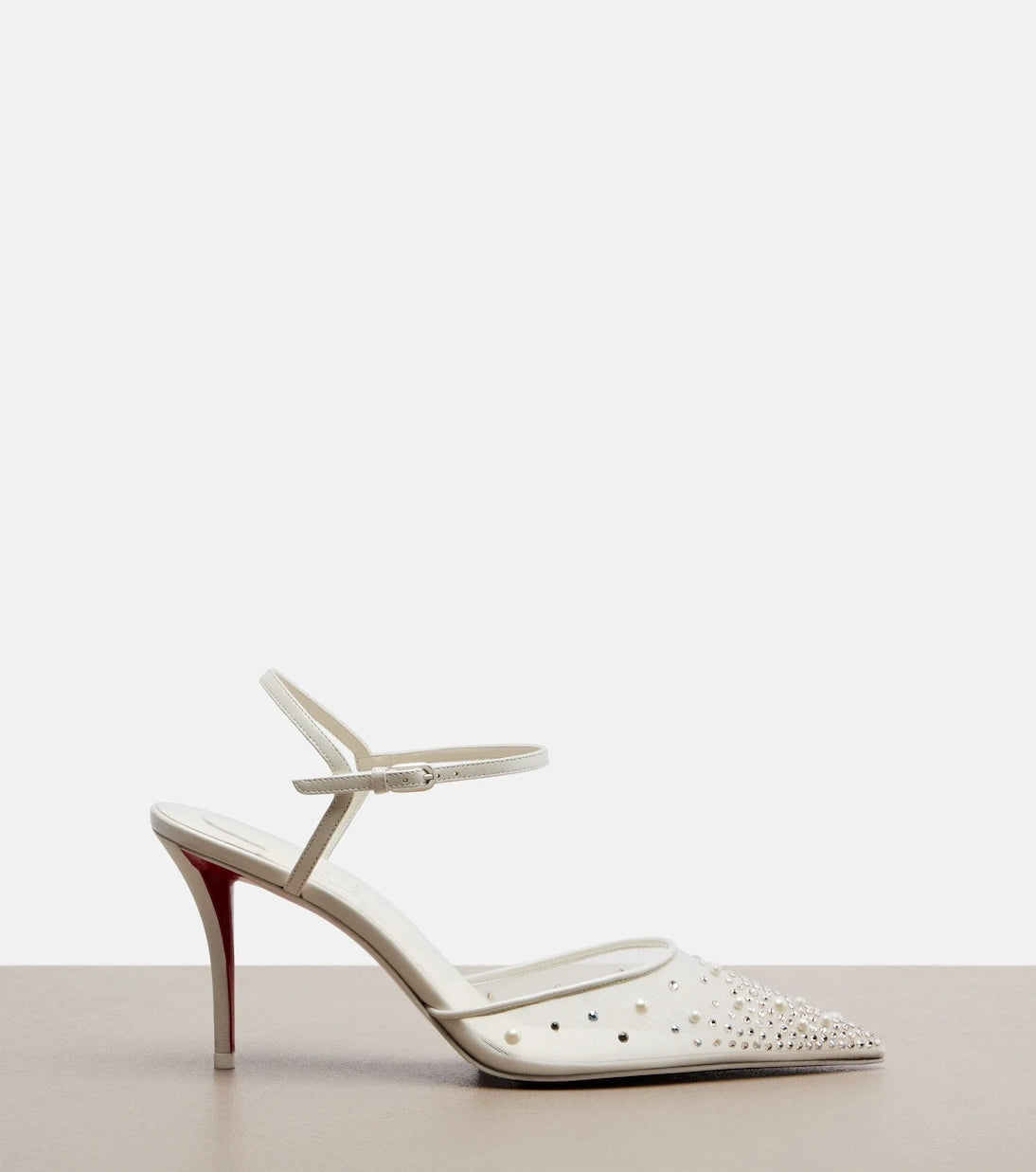 Christian Louboutin - حذاء ميس زي بكعب مزين ورباط خلفي