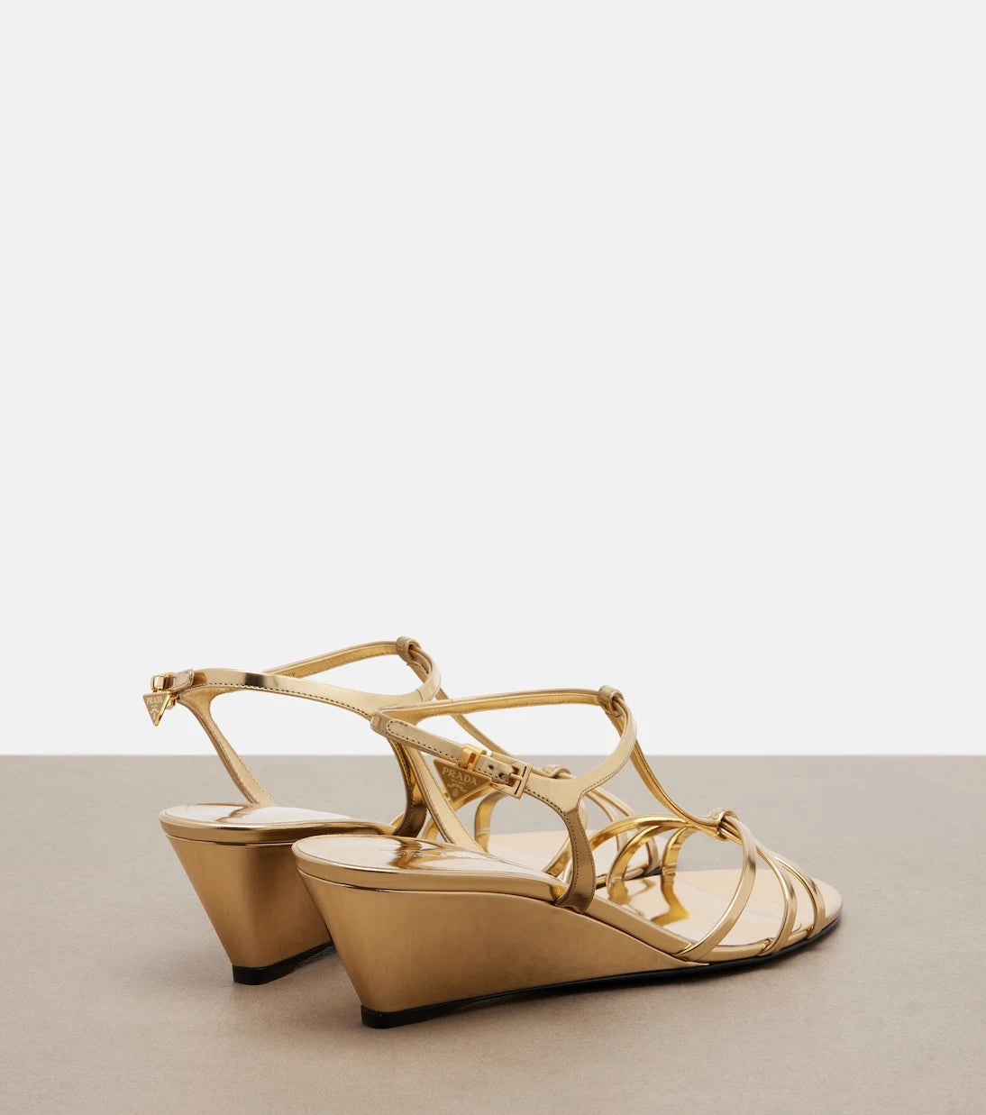 Prada - Metallic leather wedge sandals