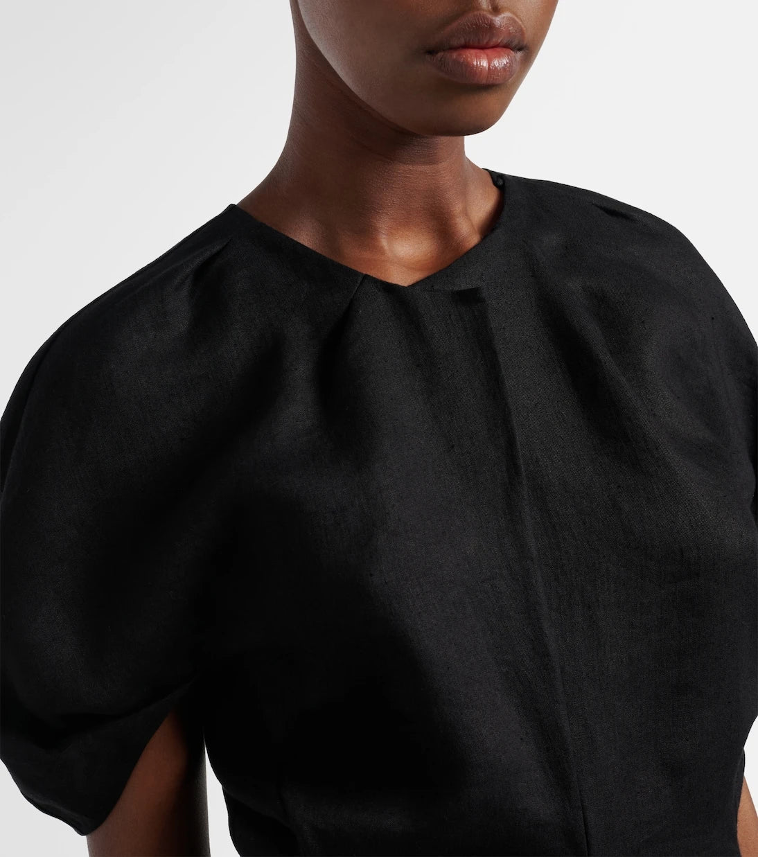 Khaite - Rumi peplum linen-blend top