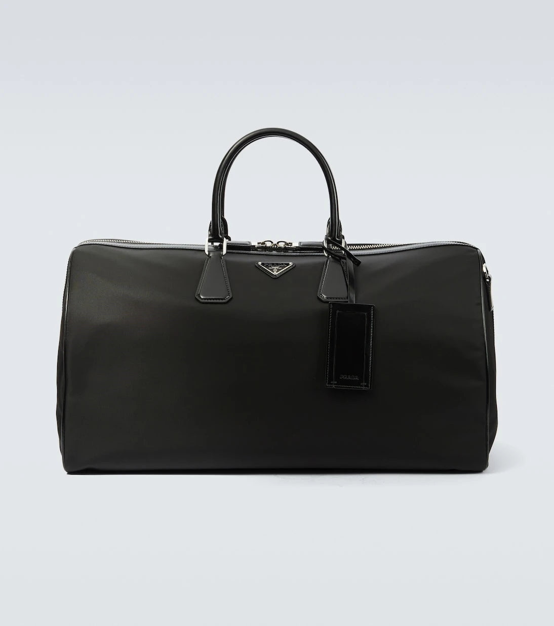Prada - Leather-trimmed duffel bag