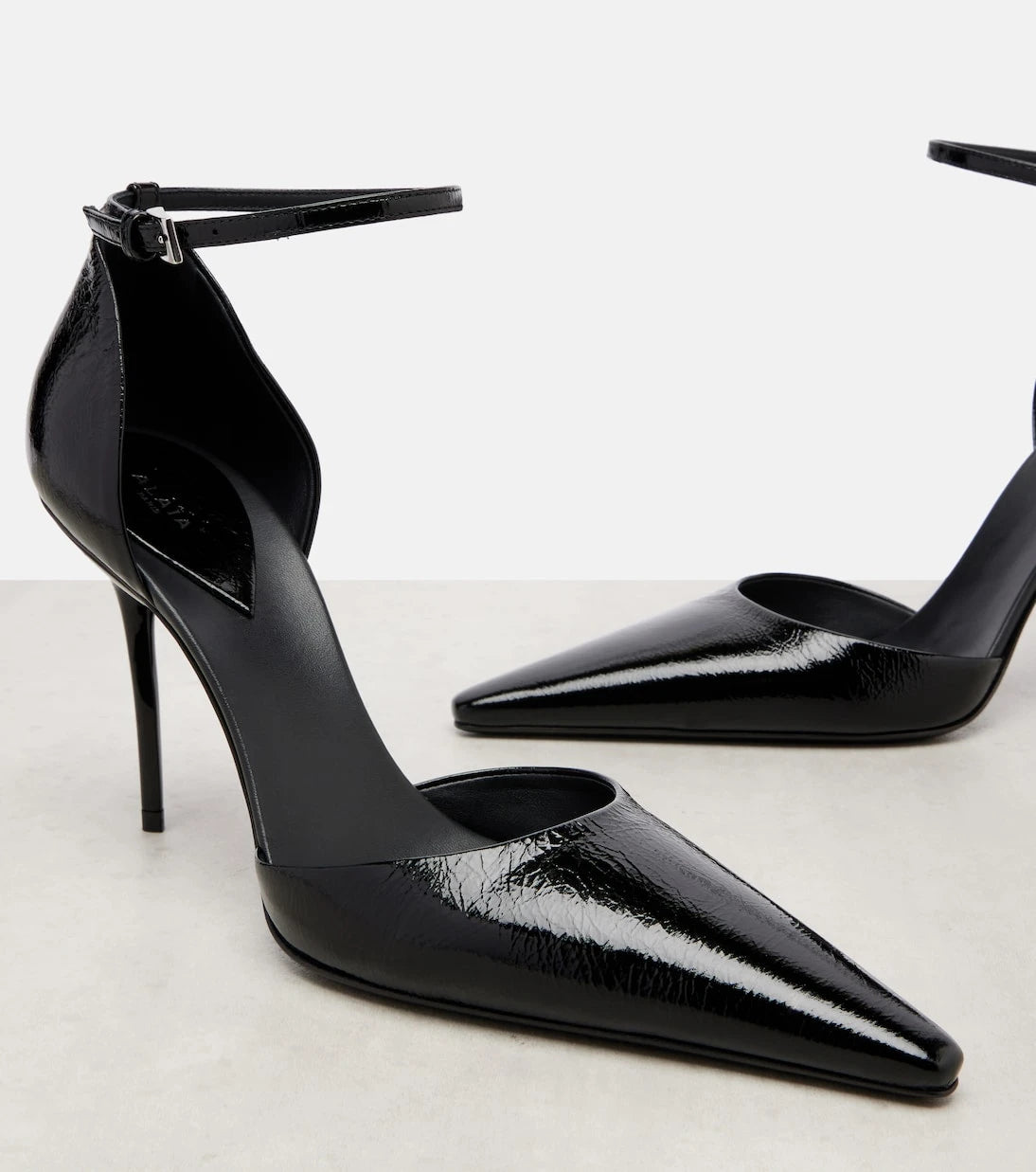 Alaïa - D'Orsay 90 patent leather pumps
