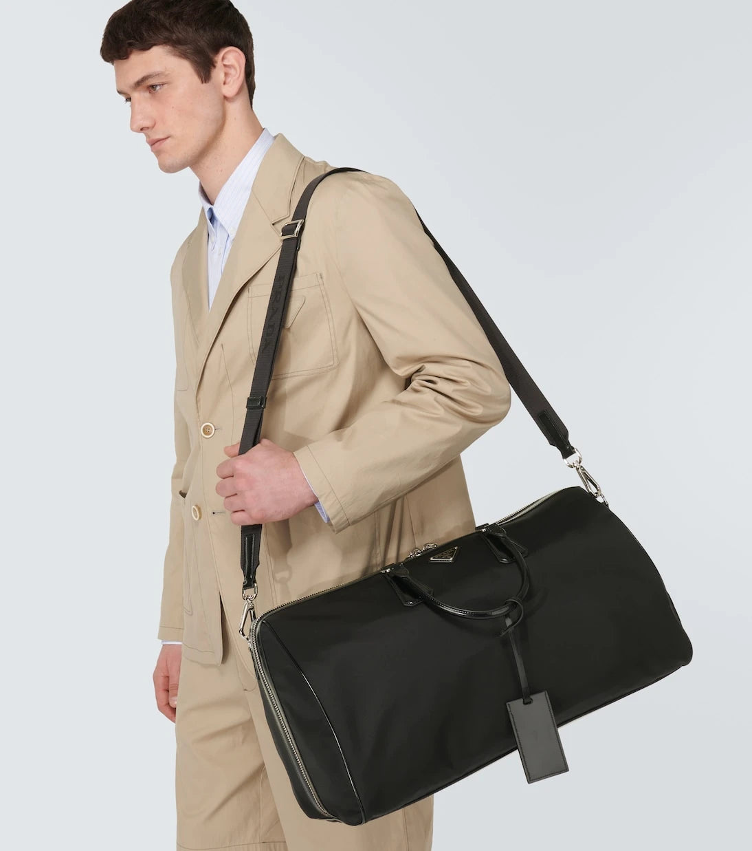 Prada - Leather-trimmed duffel bag