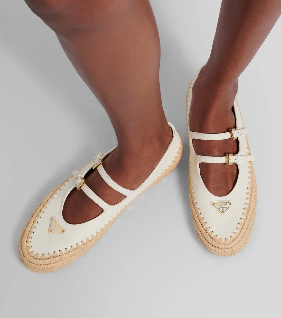 Prada - Leather and raffia Mary Jane flats