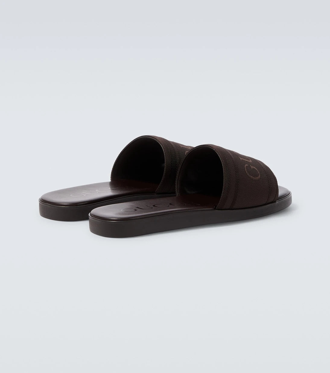 Gucci - Logo canvas and leather slides
