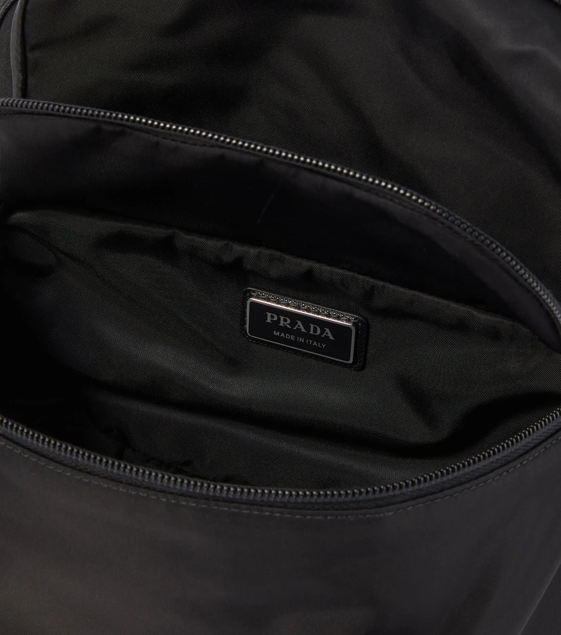 Prada - Re-Nylon leather-trimmed belt bag