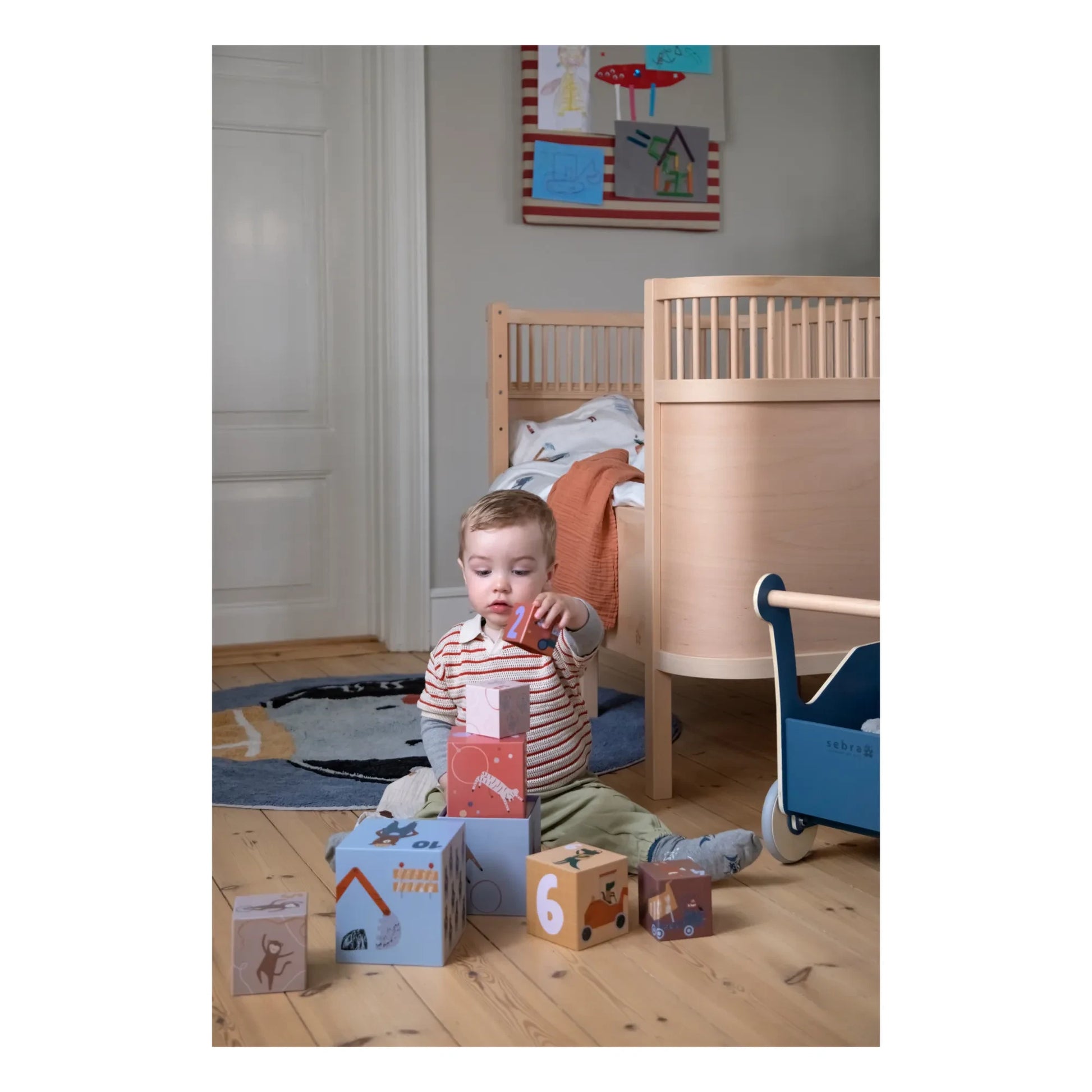 Sebra - Builders Stacking Blocks