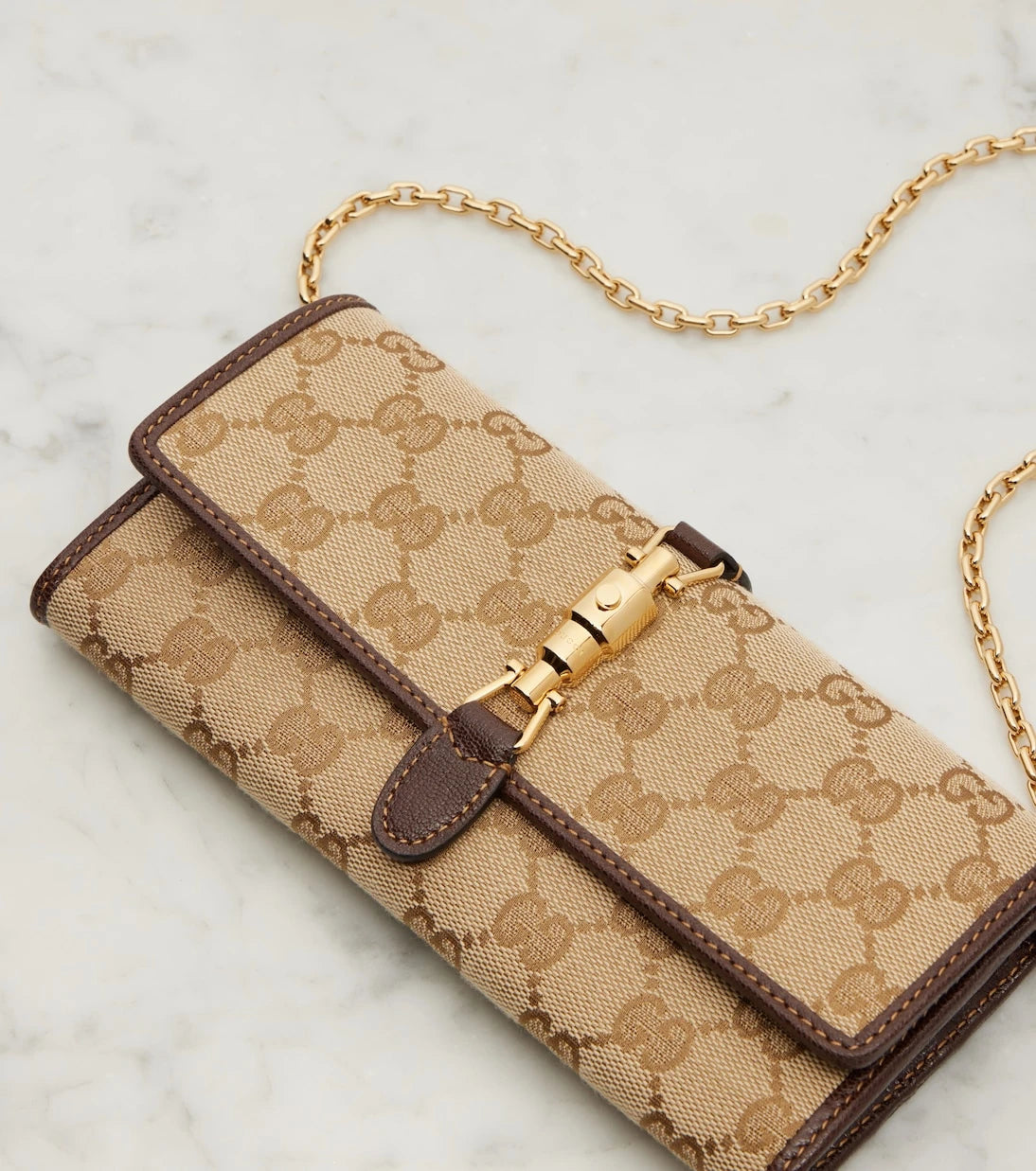 Gucci - Gucci Jackie GG Canvas clutch