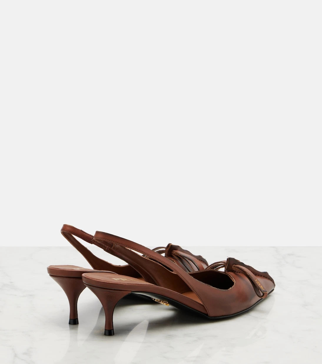 Prada - Leather slingback pumps