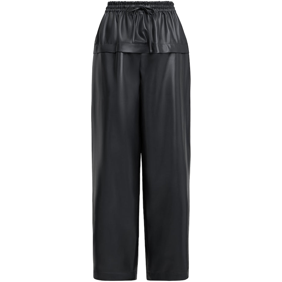 Alaïa Black Leather Peplum Trousers