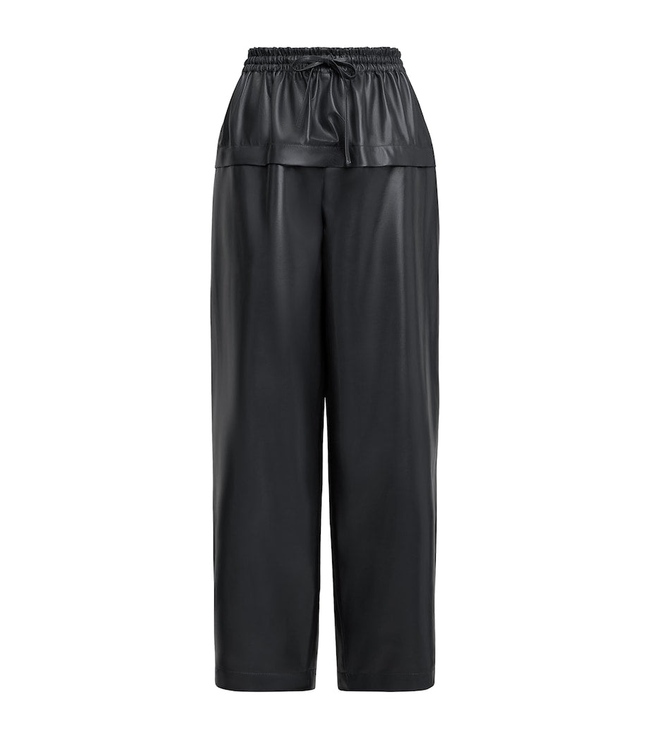 Alaïa Black Leather Peplum Trousers
