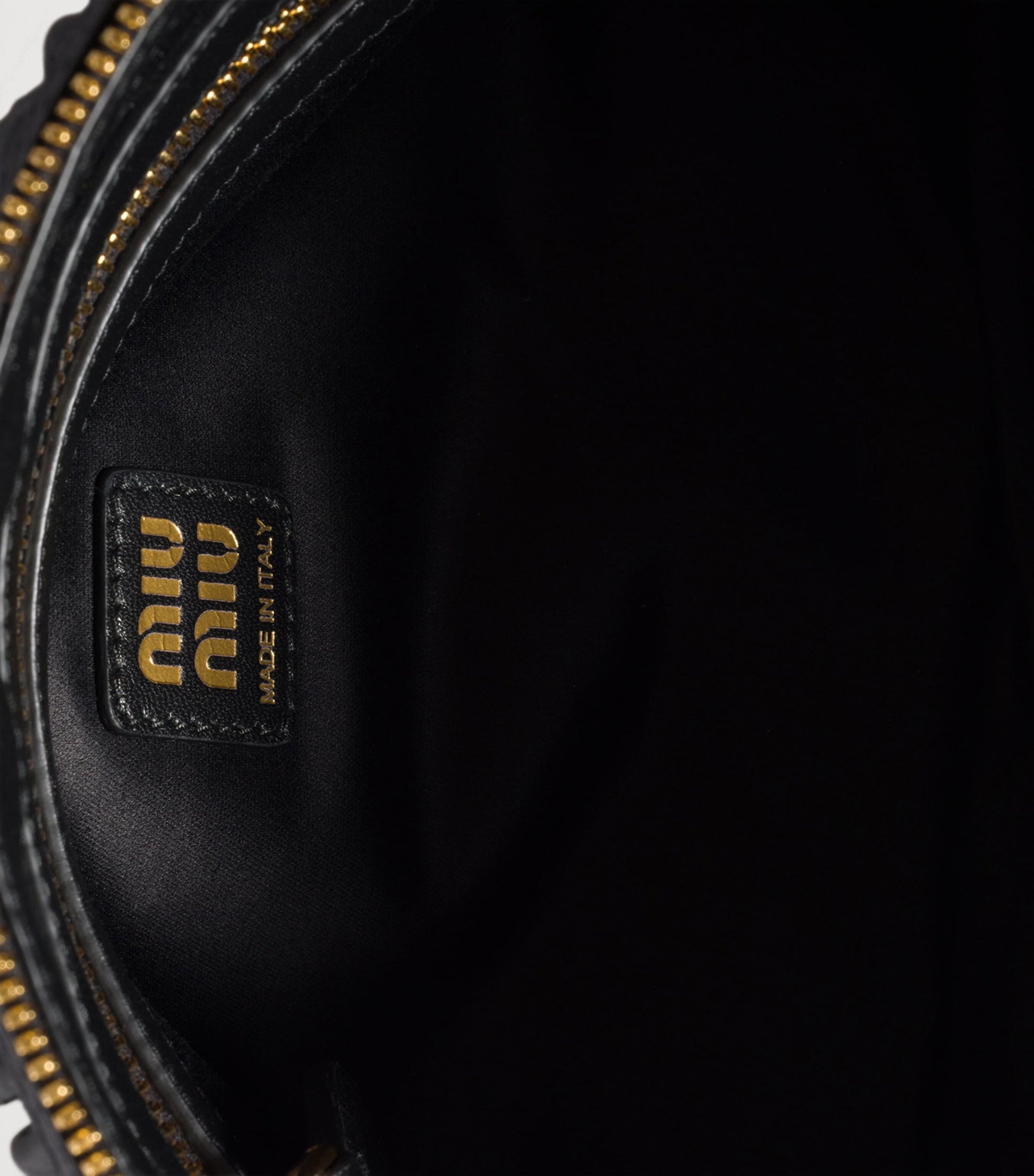 Matelassé Leather Clutch Bag