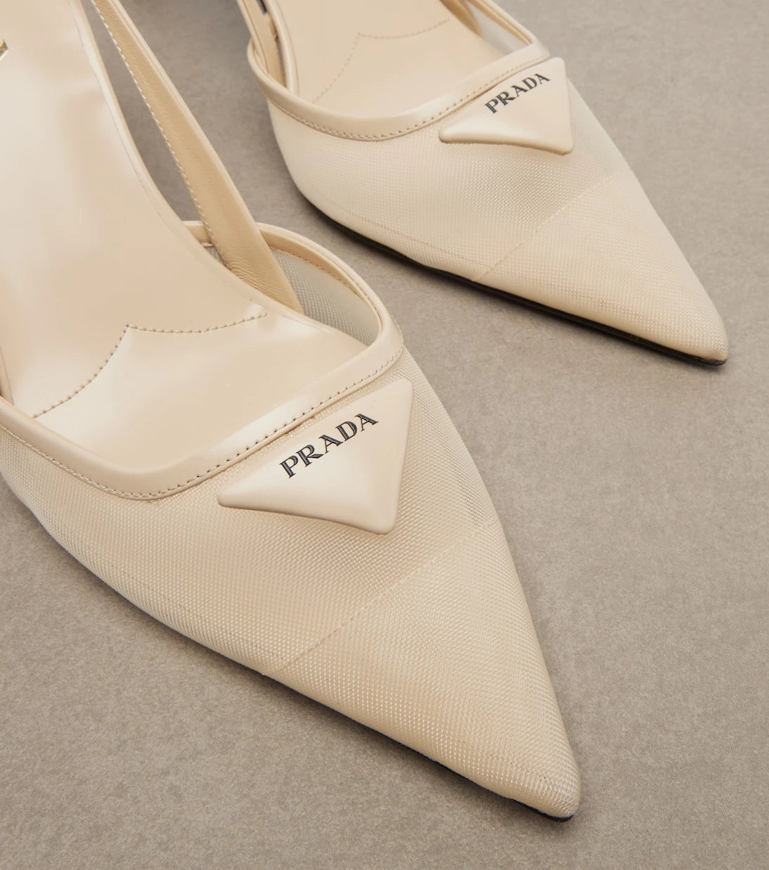 Prada - Leather-trimmed mesh slingback pumps