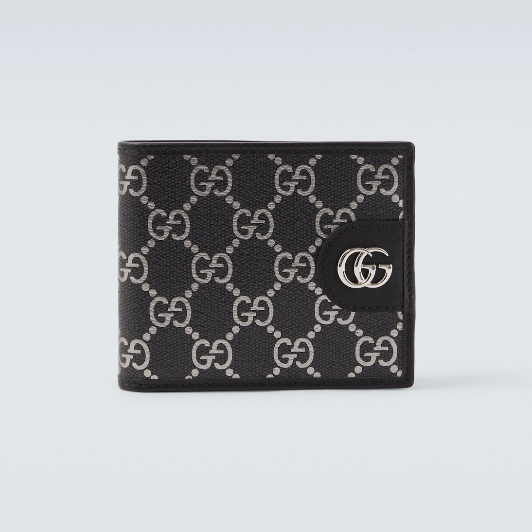 Gucci - محفظة ثنائية الطي مُزيّنة بجلد GG