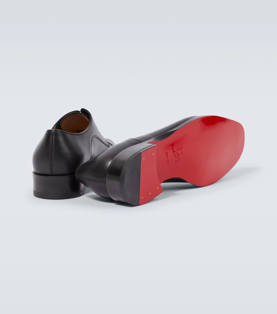 Christian Louboutin - حذاء ديربي كورتومالي من الجلد