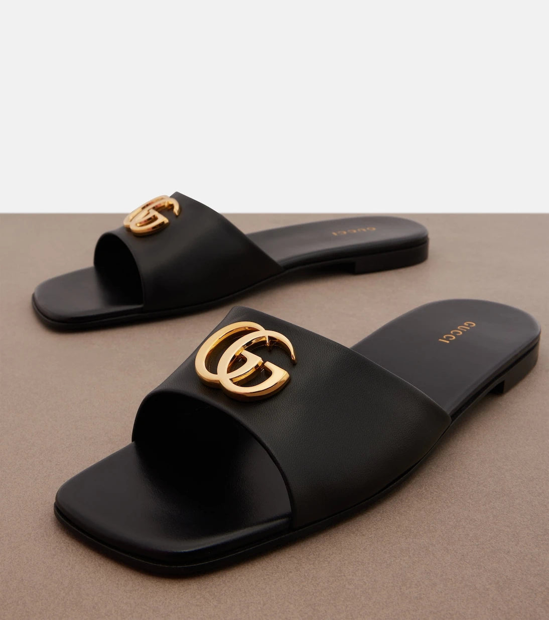 Gucci - Double G leather slides