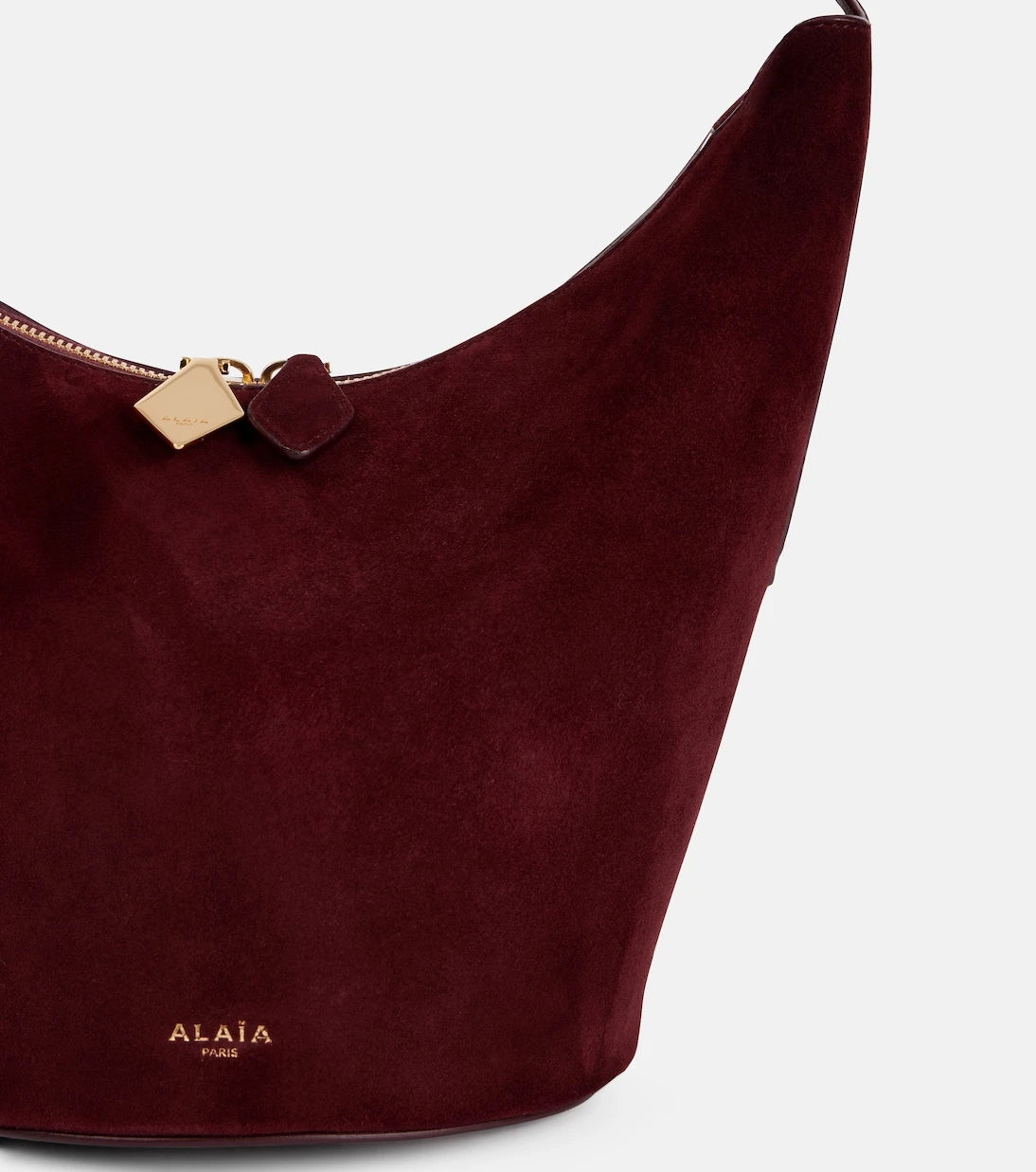 Alaïa - حقيبة دلاء صغيرة من جلد الغزال والجلد بشكل Alaïa