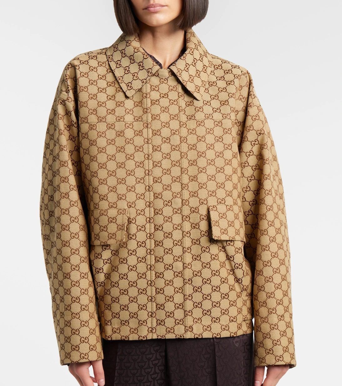 Gucci - سترة بومبر من الجلد بكنفاس GG