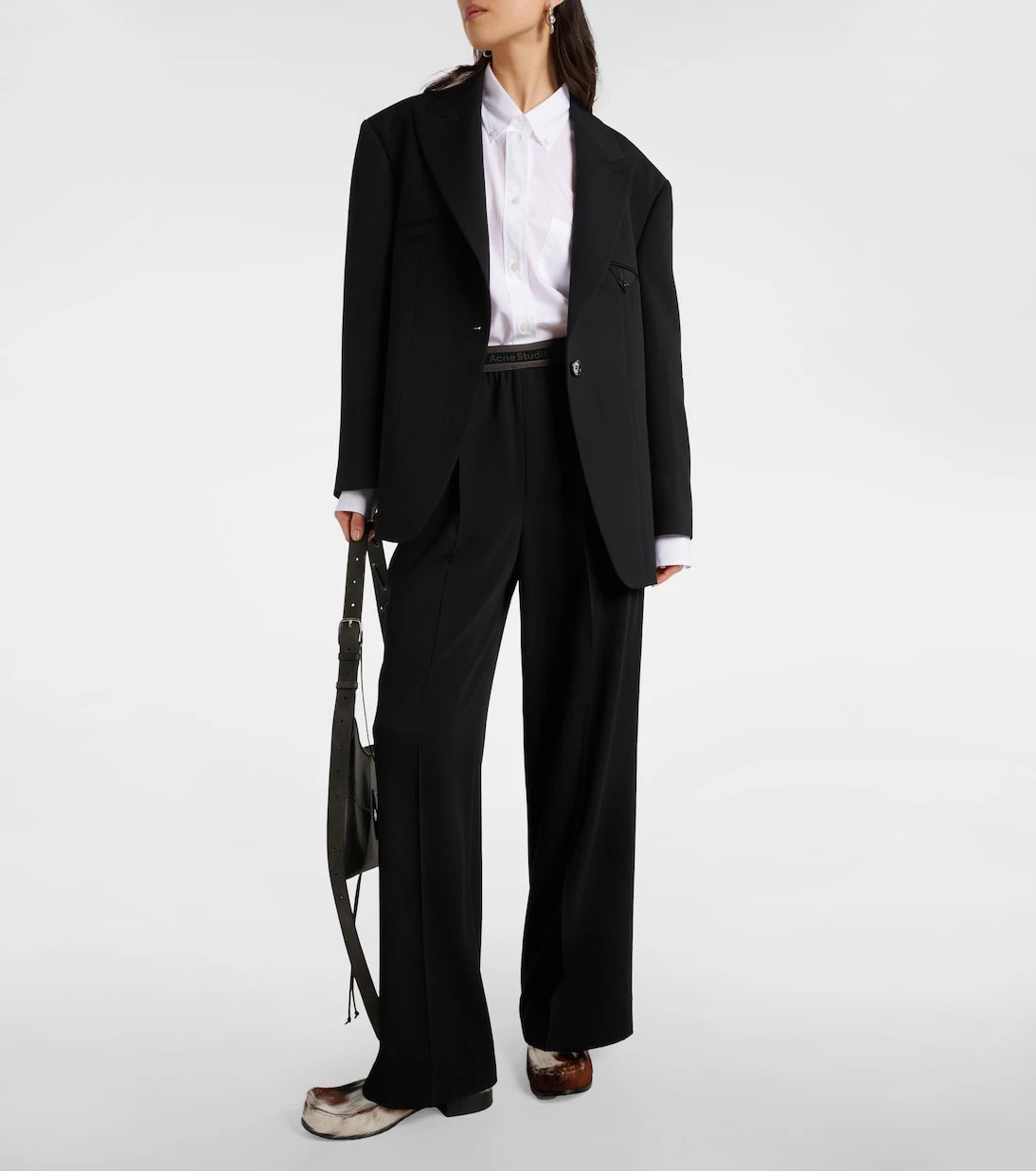 Acne Studios - بنطلون بشعار الماركة واسع الساقين بخصر متوسط الارتفاع