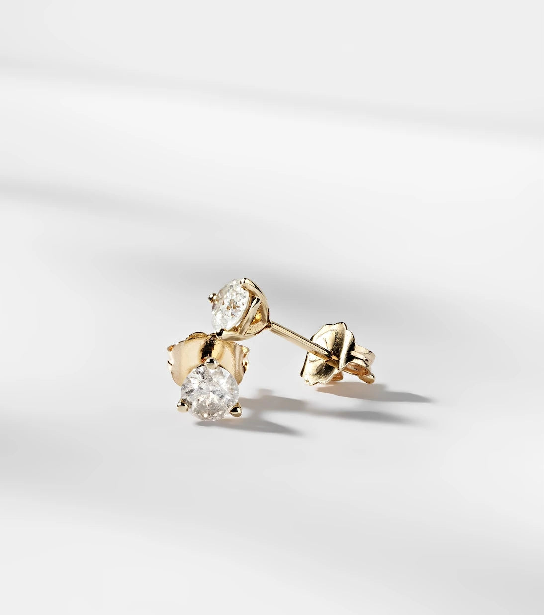 Stone and Strand - 14kt gold earrings with diamonds