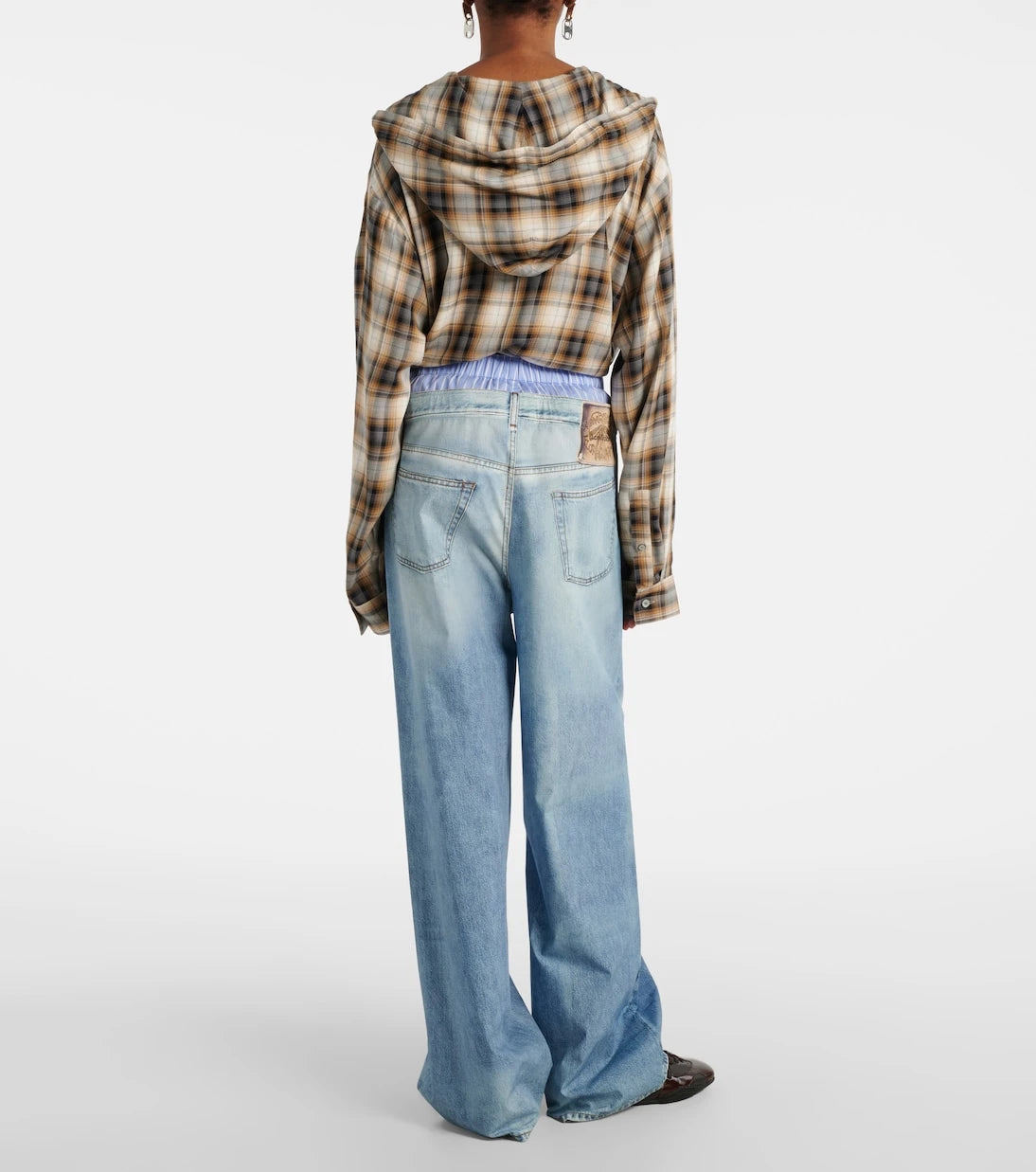 Acne Studios - بنطال واسع الساقين من قطن البوبلين بطبعة ترومبلوي