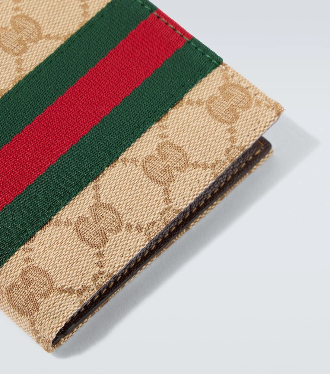 Gucci - محفظة ثنائية الطي بشريط الويب وكانفاس GG