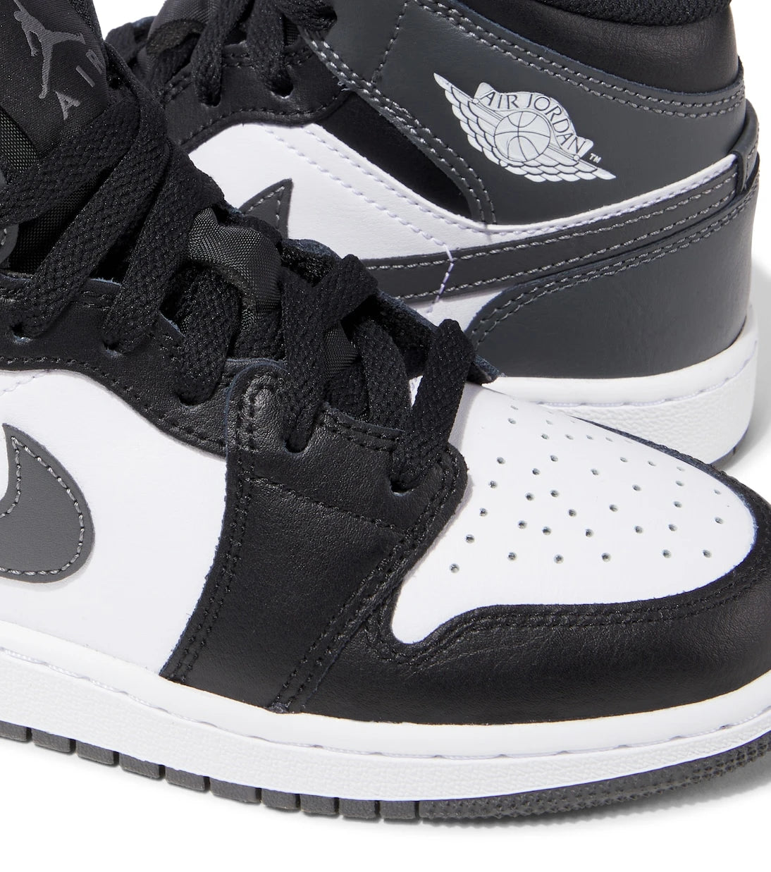 Nike Kids - حذاء سنيكرز Air Jordan 1 Mid الجلدي للأطفال